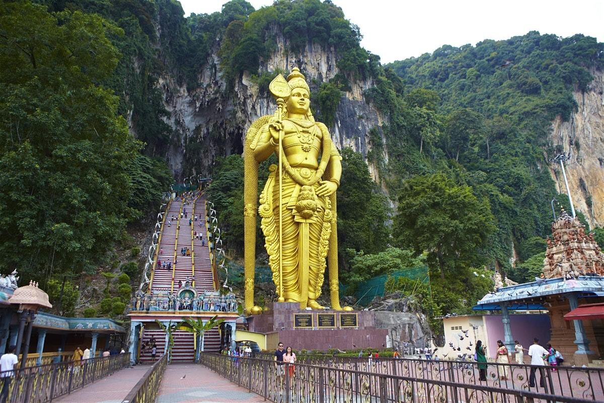 Batu caves Kuala Lumpur giant golden statue Malaysia